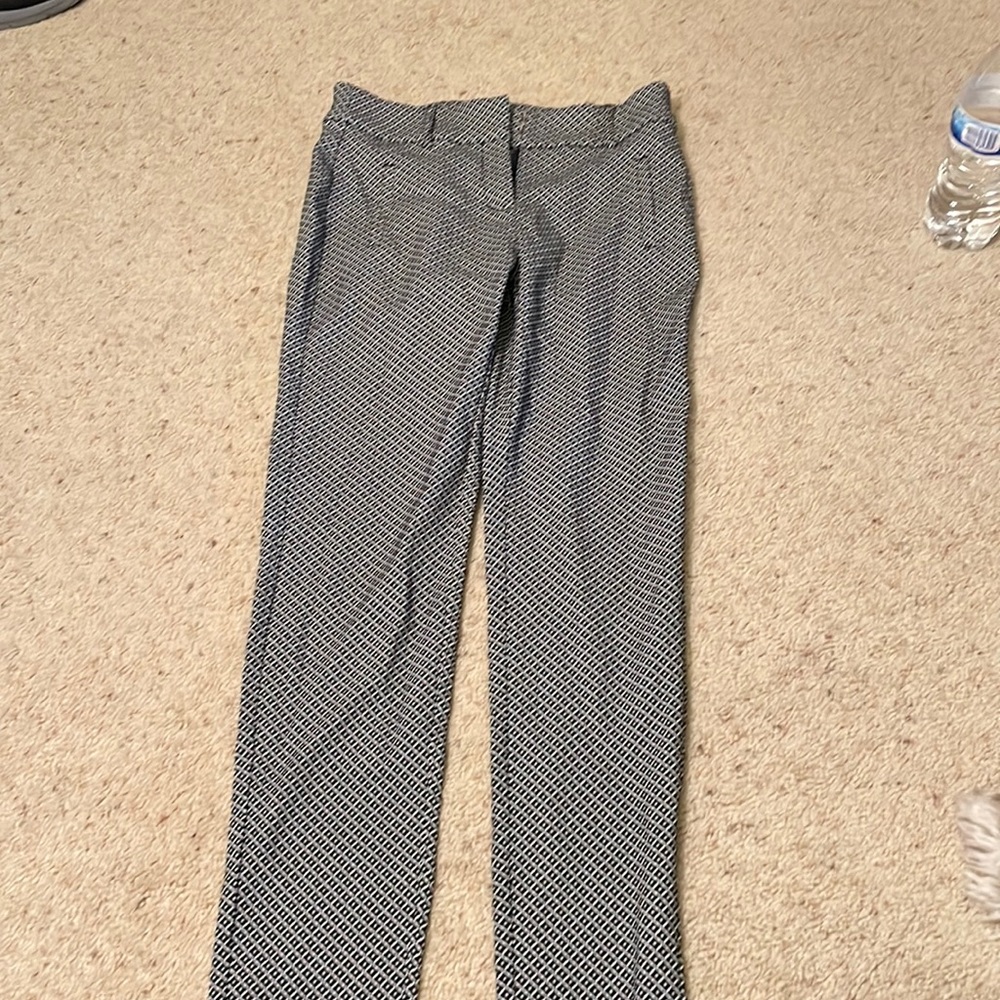 Woman’s dress pants color white and black size small